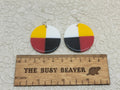 Pair of round resin slab inlay earrings, combo #41: quartered in yellow, white, red and black