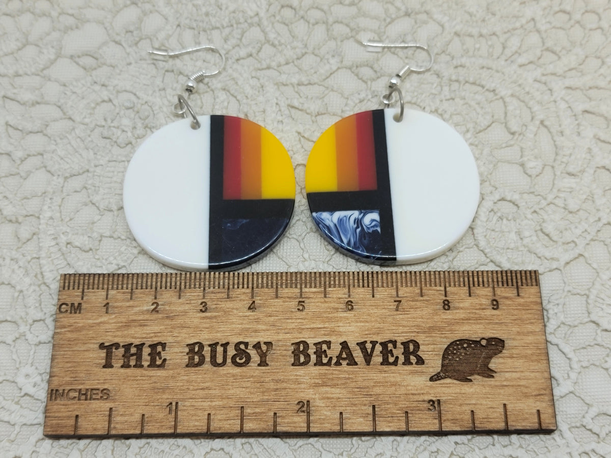 Pair of round resin slab inlay earrings, combo #42: white with sunset stripes and navy marble