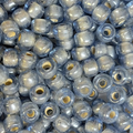 Close-up of 9mm glass crow beads in pale blue with a lustre finish
