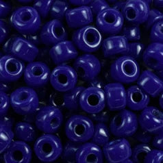 Close-up of 9mm glass crow beads in opaque sapphire, filling the frame