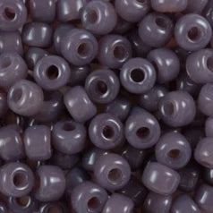 Close-up of 9mm glass crow beads in opaque dark taupe, filling the frame