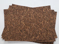 Stack of #47 dark cork-look faux leather sheets in mottled deep brown