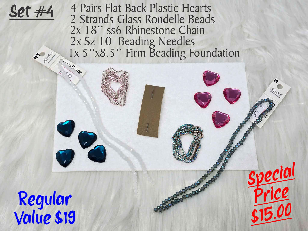 Set #4: faceted teal and pink plastic hearts, two rondelle strands, rhinestone chain and needles on white foundation