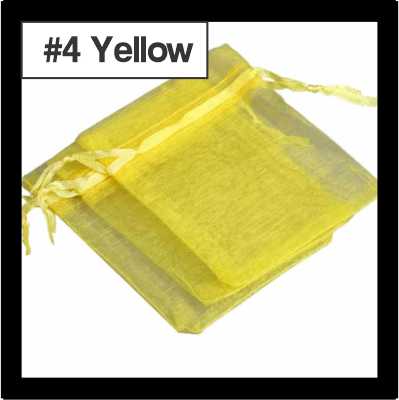 Sheer yellow organza drawstring bags with satin ties, with a numbered colour label