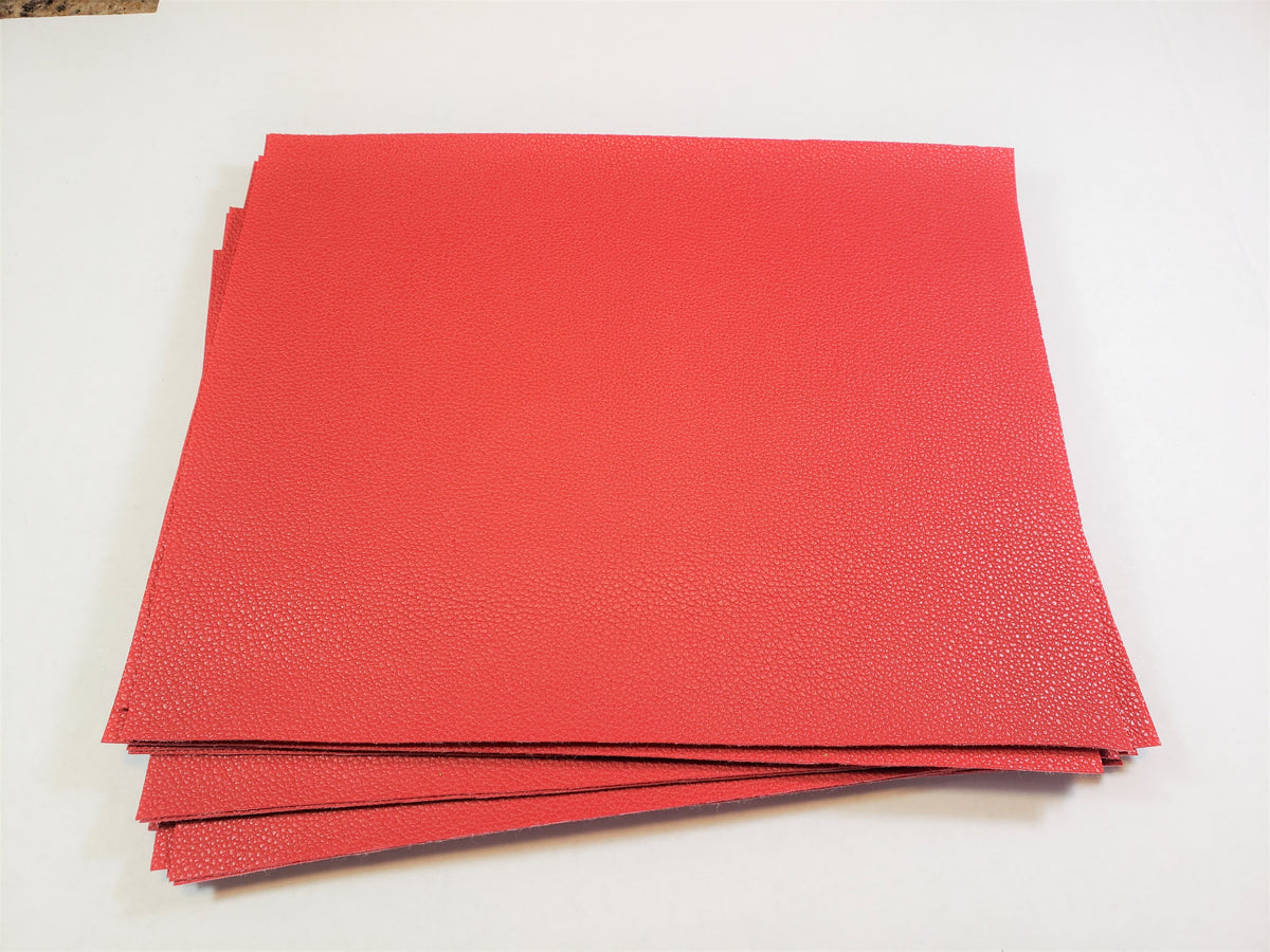 Stack of #4 red faux leather sheets with a pebbled grain texture