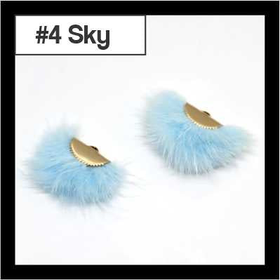 Pair of fan-shaped sky faux mink tassels with gold-tone caps, labelled #4