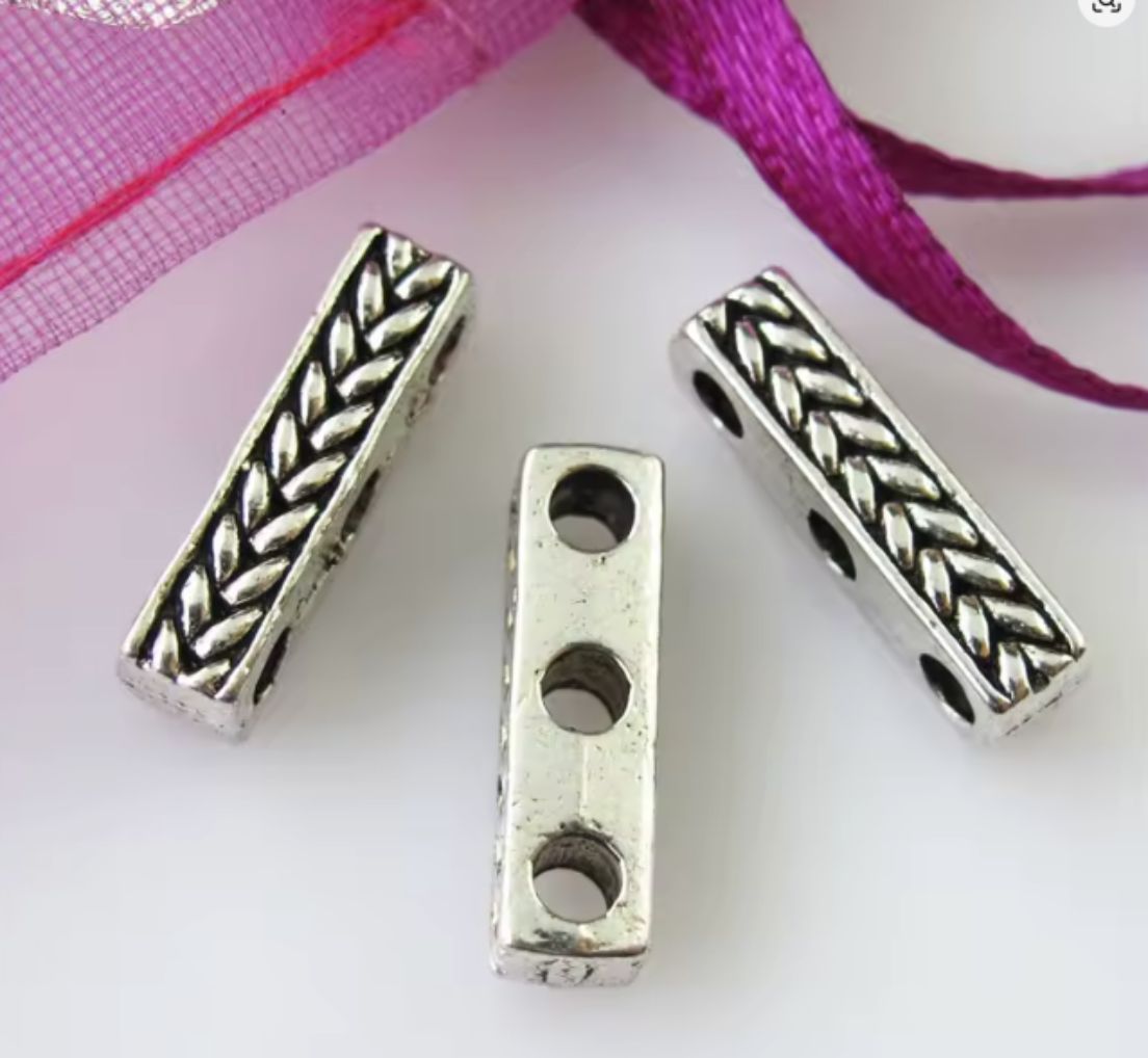 Silver-tone 4 x 15mm braided 3-hole spacer bars, seen from above