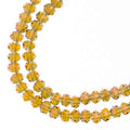 Two strands of Crystal Lane 3x4mm faceted glass rondelle beads in transparent light amber w purple luster