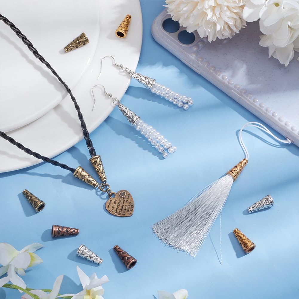 Bead cones used to cap tassels and pendants on a light blue surface