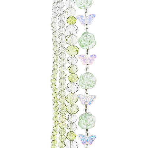 Four strands of Crystal Lane glass beads with flower, leaf and faceted round beads in a green ombre mix