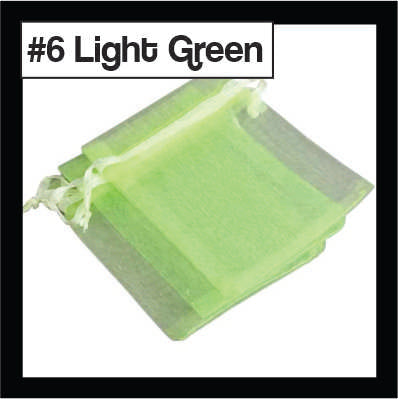 Sheer light green organza drawstring bags with satin ties, with a numbered colour label