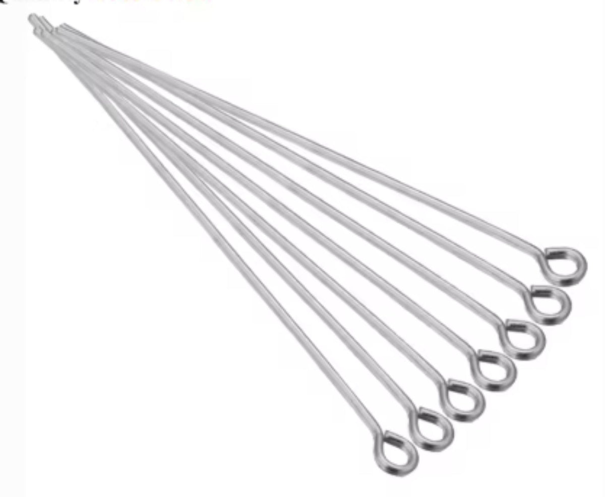 Fan of 70mm rhodium 20 gauge eye pins, each with a small round loop at one end, on white