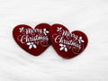 Pair of 37mm resin heart cabochons (cabs) in deep red with Merry Christmas in white script