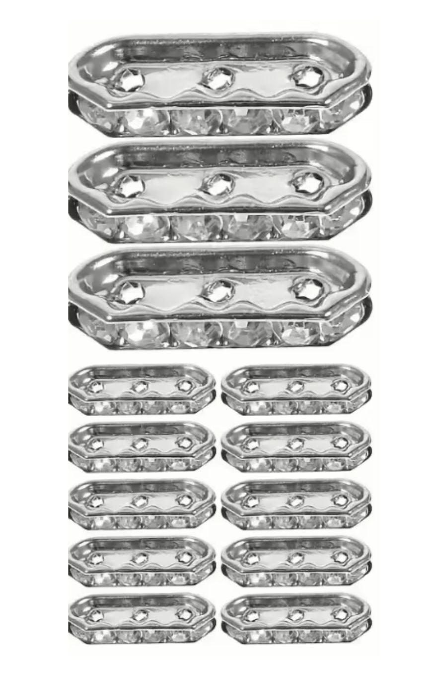 Rows of silver-tone 8 x 20mm 3-hole spacer bars set with clear rhinestones