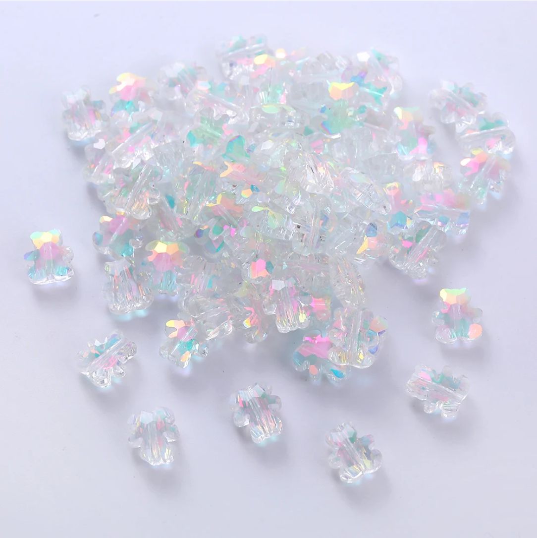 Clear 8 x 9.5mm glass bear beads with an AB shimmer on a white background