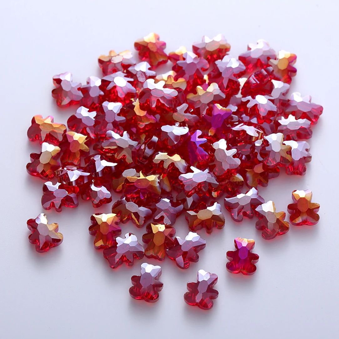 Red 8 x 9.5mm glass bear beads with an AB shimmer on a white background