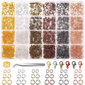 Divided case of mixed jump rings and lobster clasps in many metal colours, with tweezers and an opener
