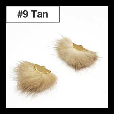 Pair of fan-shaped tan faux mink tassels with gold-tone caps, labelled #9