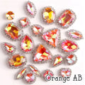 Sew-on crystal rhinestones in orange AB, in 10 shapes with silver claw settings