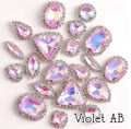 Sew-on crystal rhinestones in violet AB, in 10 shapes with silver claw settings