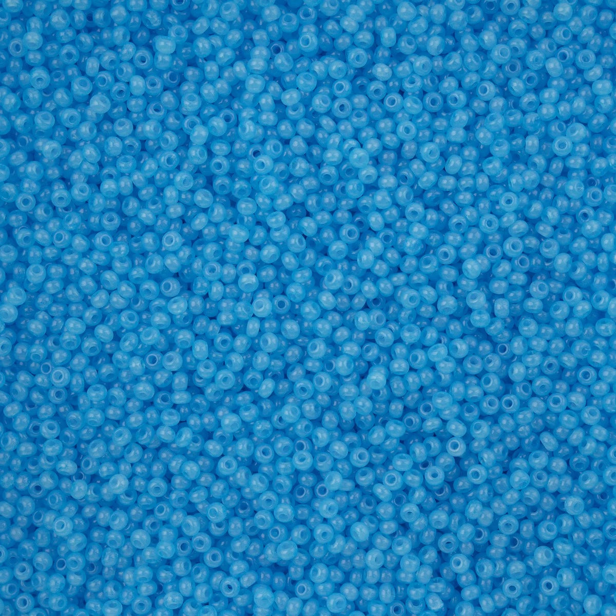 Close-up of Preciosa 11/0 Czech glass seed beads in alabaster aqua solgel
