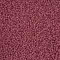 Close-up of Preciosa 11/0 Czech glass seed beads in alabaster dark pink solgel