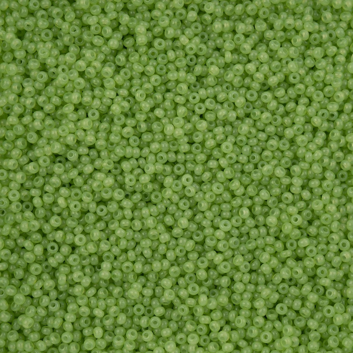 Close-up of Preciosa 11/0 Czech glass seed beads in alabaster green solgel