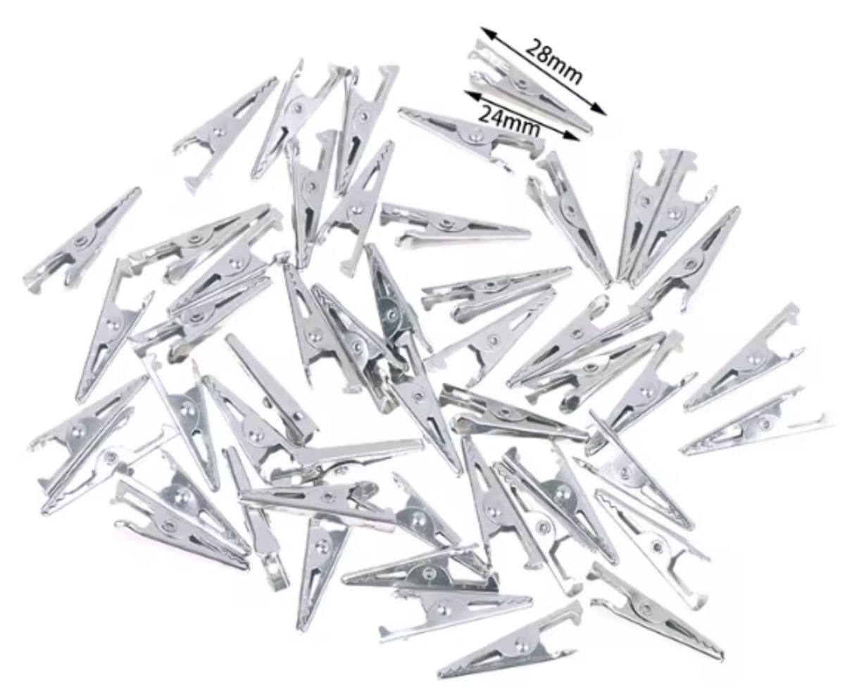 Pile of silver-tone 28mm alligator clips with toothed jaws, with size marks