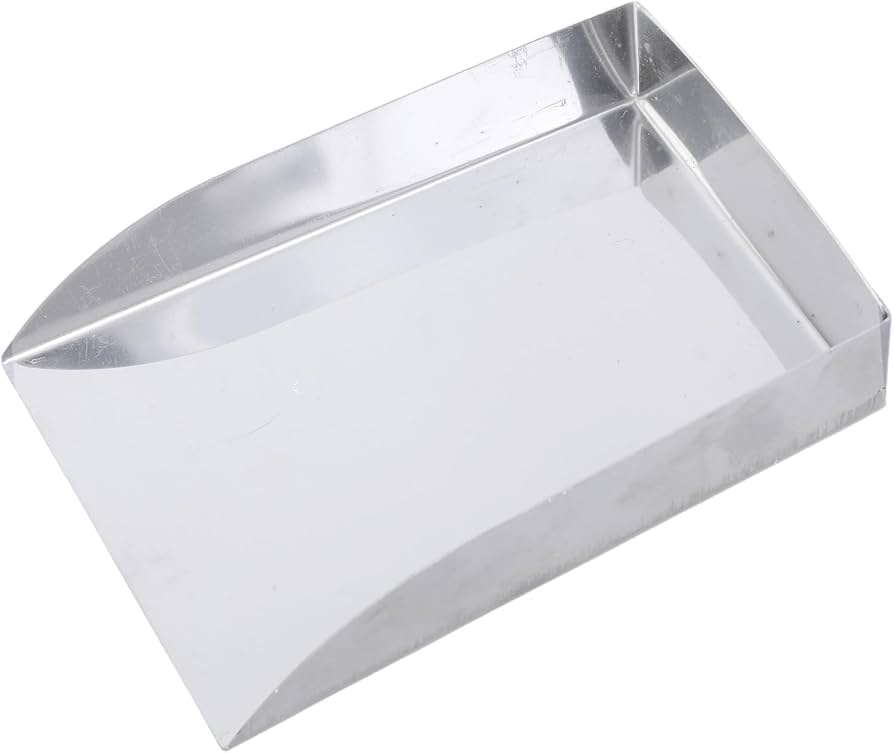 Silver metal bead shovel with a flat scoop and folded sides on a white background
