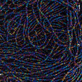 Close-up of strung Preciosa 13/0 true cut charlotte beads in black iris