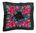 27 x 27 inch black kokum scarf laid flat with a border of pink roses, blue flowers and green leaves