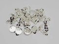 Pile of silver-plated clip-on earrings with 12mm flat round pads