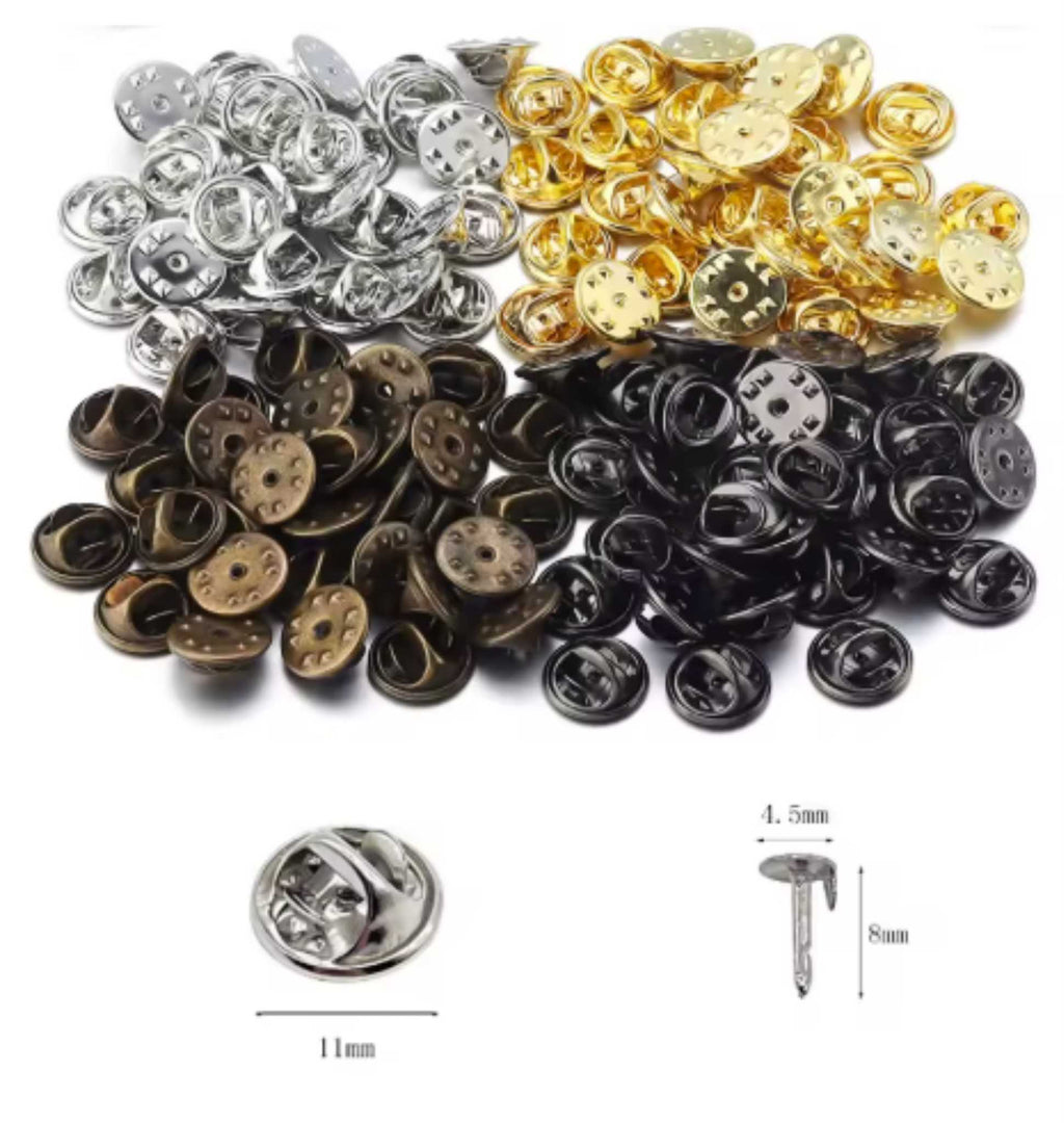 Piles of 4.5 x 8mm brooch pins with pinch back clutches in mixed metal colours