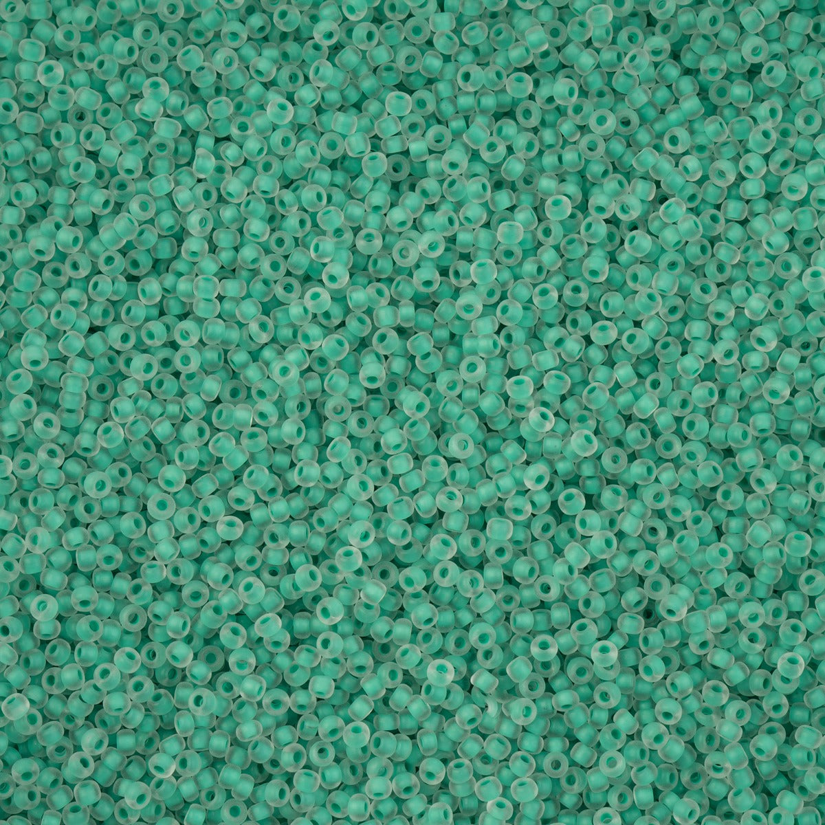Close-up of Preciosa 11/0 Czech glass seed beads in colour-lined mint terra matte