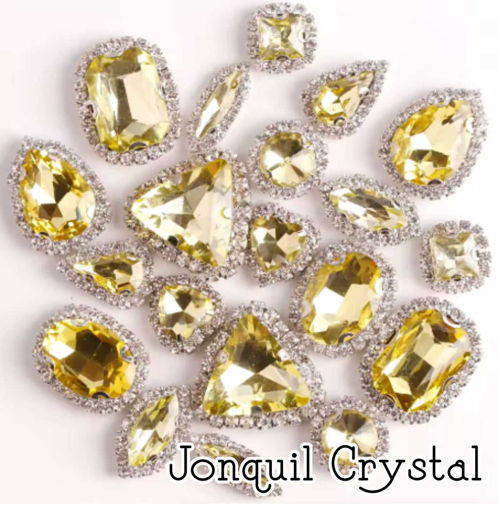 Sew-on crystal rhinestones in jonquil crystal, in 10 shapes with silver claw settings