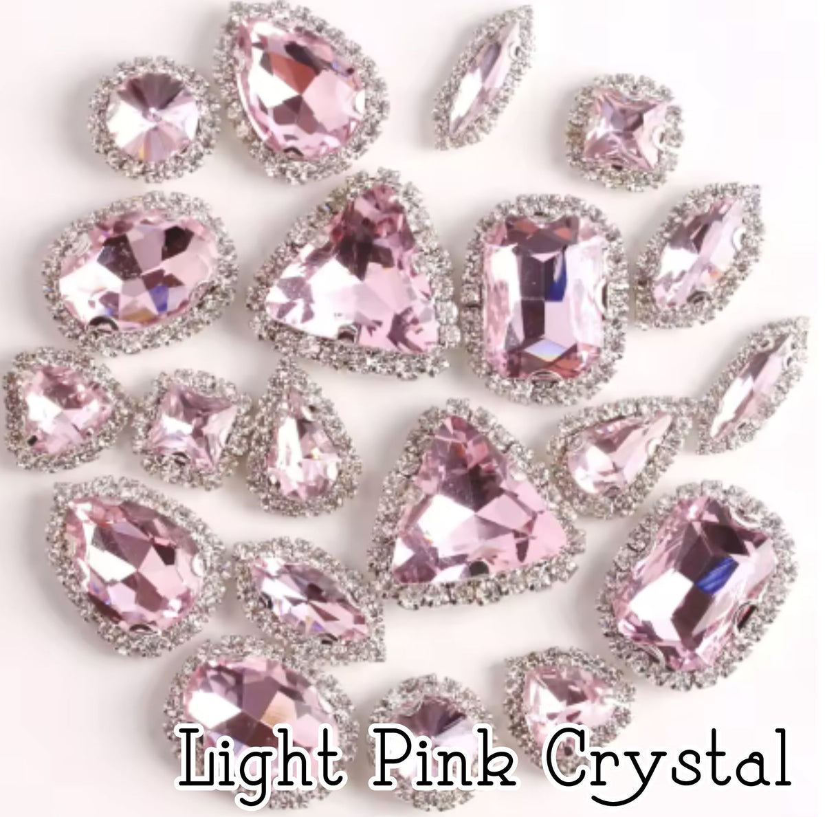 Sew-on crystal rhinestones in light pink crystal, in 10 shapes with silver claw settings