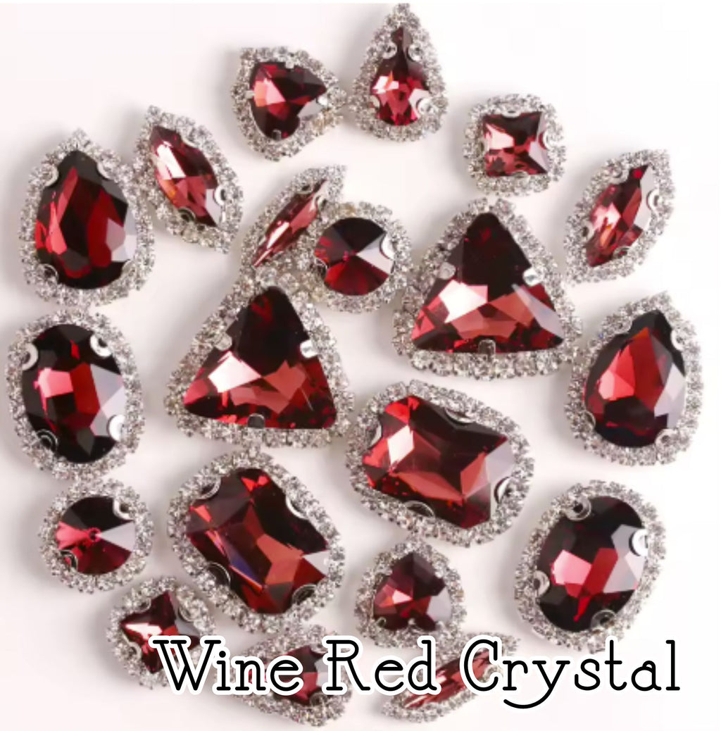 Sew-on crystal rhinestones in wine red crystal, in 10 shapes with silver claw settings