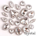 Sew-on crystal rhinestones in clear crystal, in 10 shapes with silver claw settings