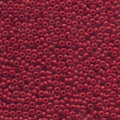Close-up of Preciosa 11/0 Czech glass seed beads in opaque dark red
