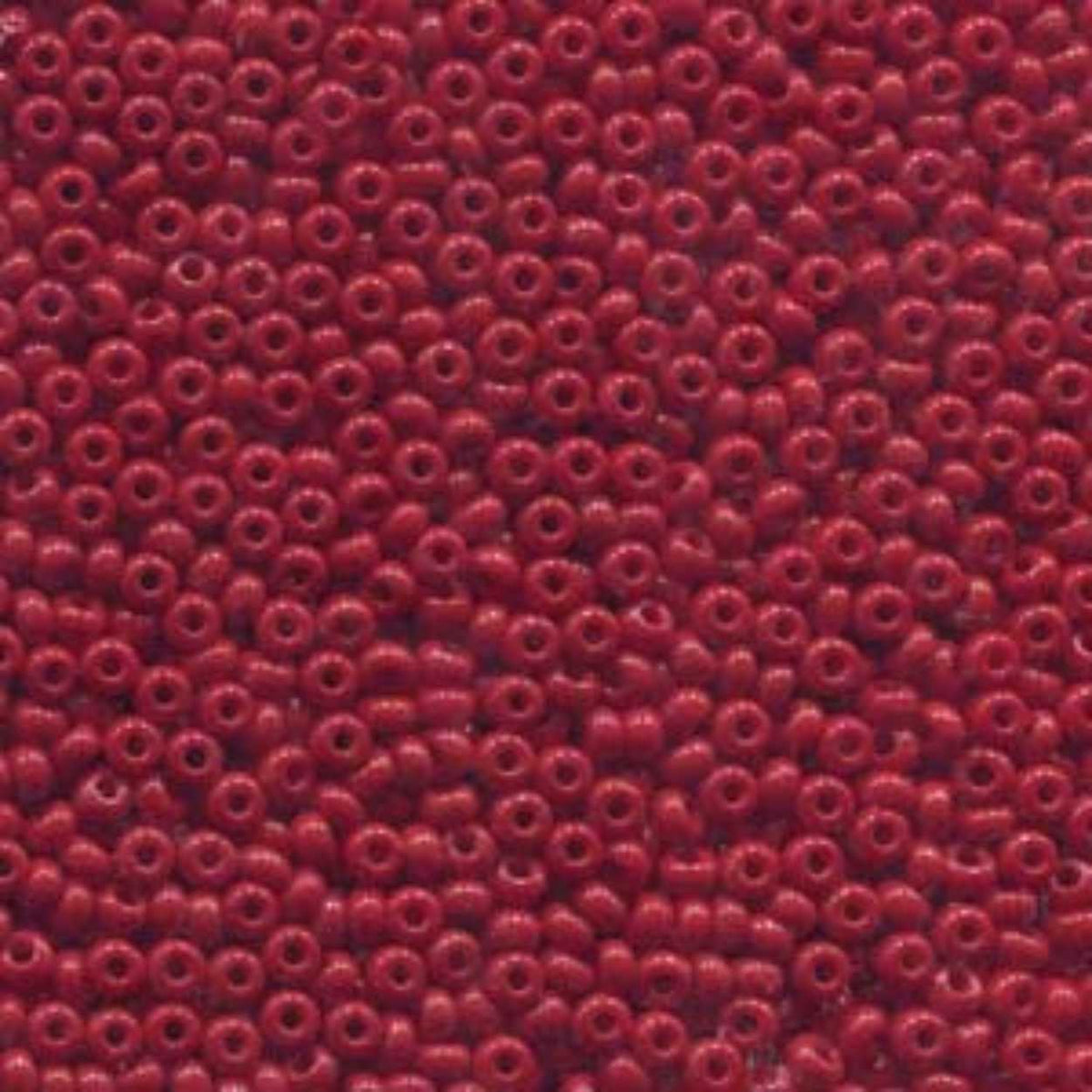 Close-up of Preciosa 11/0 Czech glass seed beads in opaque dark red