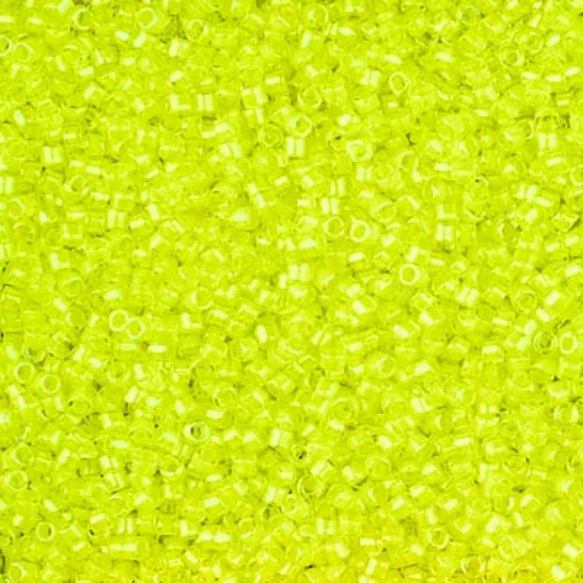 Close-up of Miyuki Delica 11/0 DB2031 cylinder beads in luminous limeade