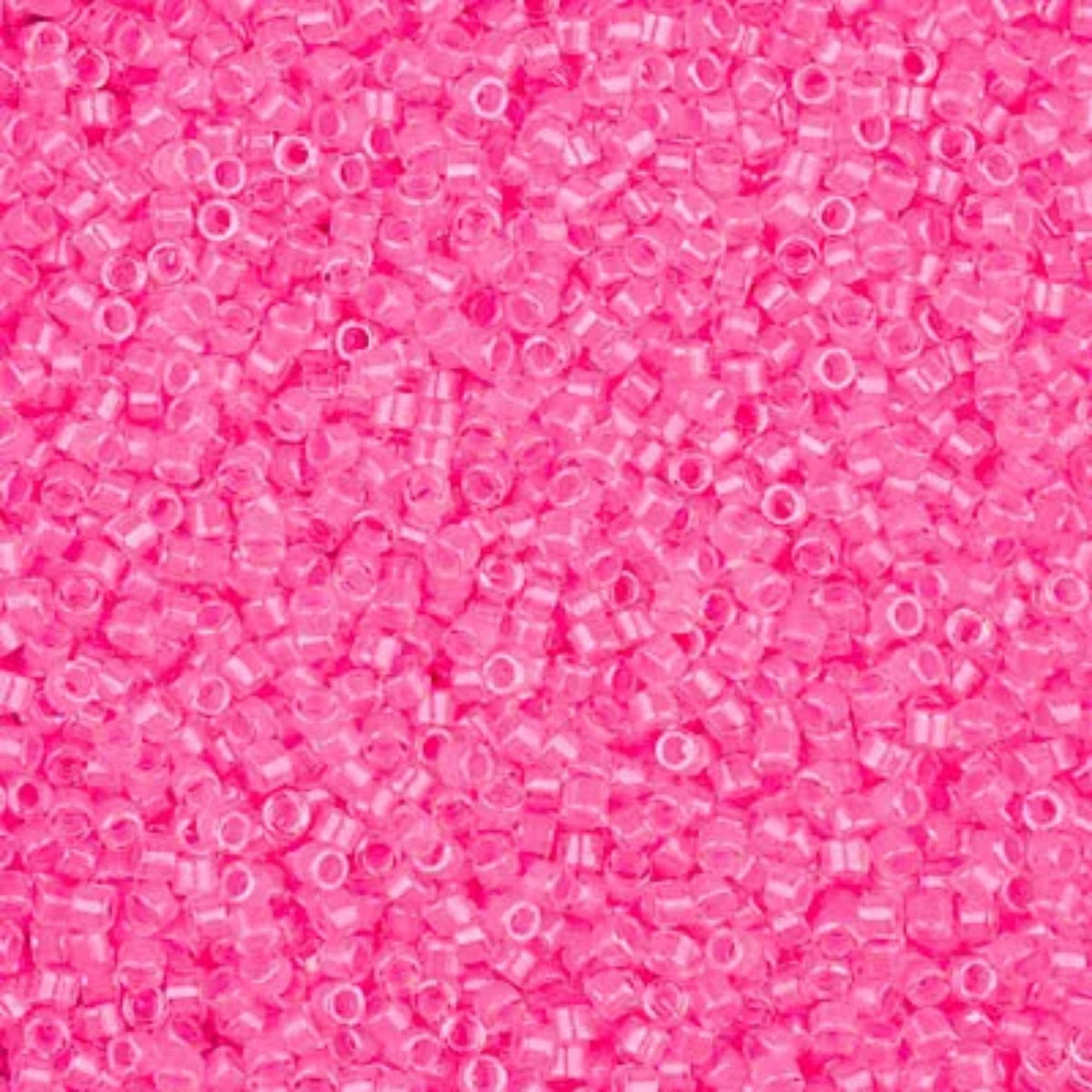 Close-up of Miyuki Delica 11/0 DB2036 cylinder beads in luminous cotton candy