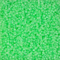 Close-up of Miyuki Delica 11/0 DB2040 cylinder beads in luminous mint green