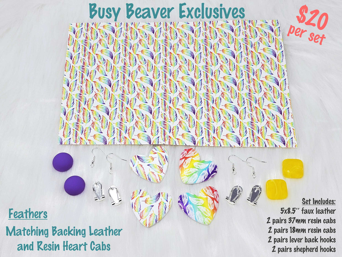 5 x 8.5 inch rainbow feather faux leather with matching 37mm heart and 18mm resin cabochons (cabs) and hooks