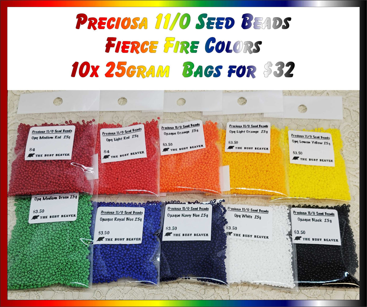 Ten 25g bags of Preciosa 11/0 seed beads in Fierce Fire colours: reds, orange, yellows, green, blues, white and black