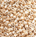 Close-up of Miyuki Delica 11/0 DB0411 cylinder beads in galvanized gold