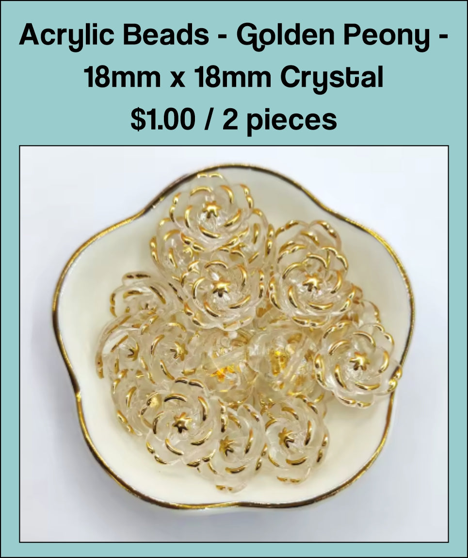 Dish of 18mm crystal acrylic peony flower beads with gold-tone edging
