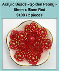 Dish of 18mm red acrylic peony flower beads with gold-tone edging