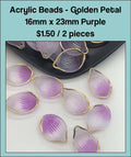 Pile of 16 x 23mm acrylic petal charms in purple with gold-tone edges