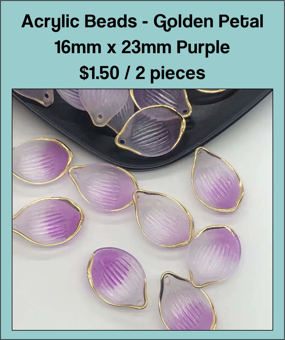 Pile of 16 x 23mm acrylic petal charms in purple with gold-tone edges